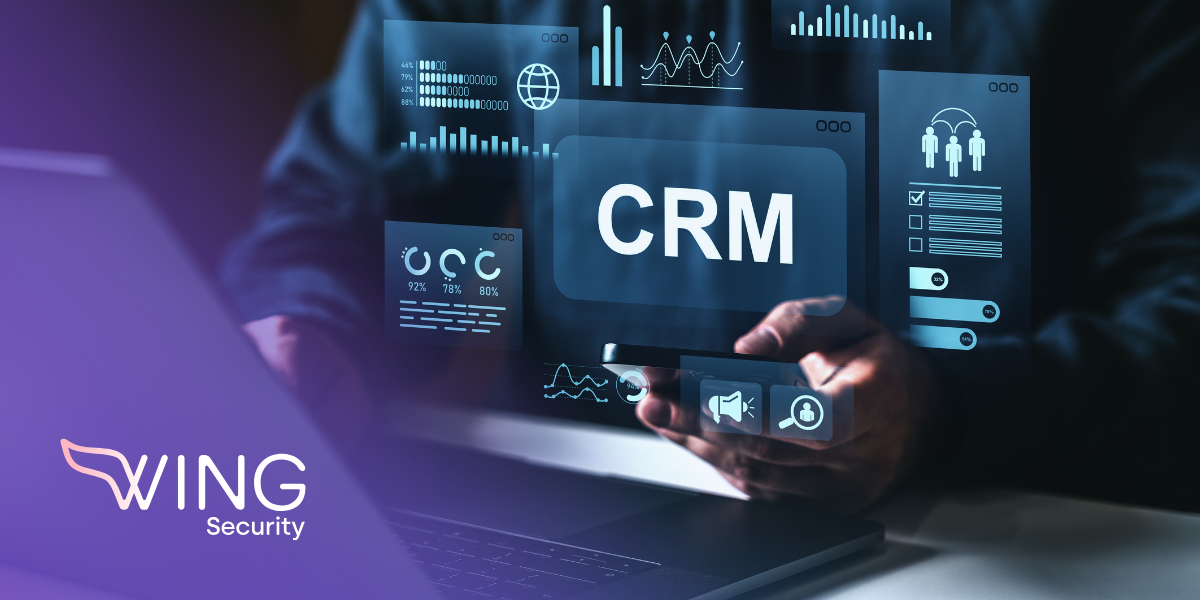 at computer looking at a CRM